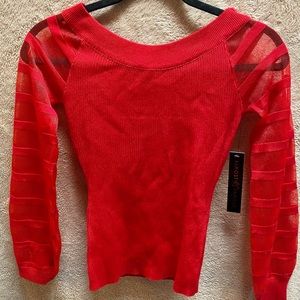 Red top with see thru sleeves